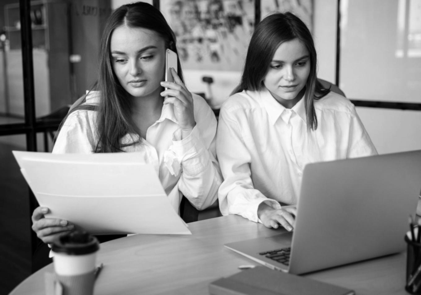 Business planning workspace with financial documents and planning materials